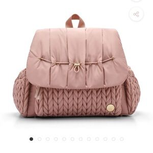 HAPP baby diaper bag with matching changing pad.